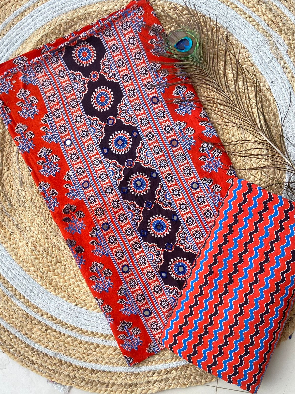 Introducing Ajrakh panel print top and printed bottom combos
With full *panel mirror work*
Exclusive Handwork
Ajrakh print top and bottom